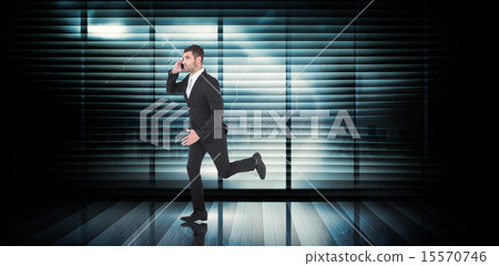 Composite image of businessman running on the phone 15570746