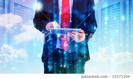 Composite image of businessman scrolling on his digital tablet 15571104