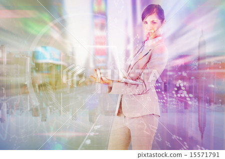 Composite image of confident young businesswoman with laptop 15571791