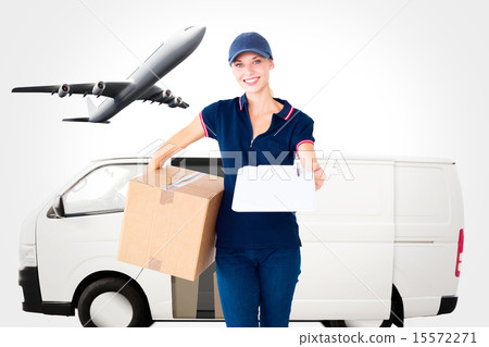 Composite image of happy delivery woman holding cardboard box an Composite image of happy delivery woman holding cardboard box an 15572271
