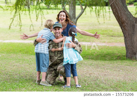 Handsome soldier reunited with family 15573206