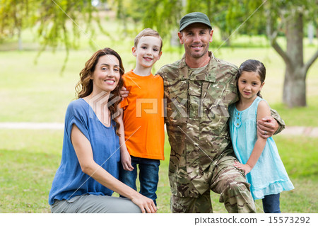 Handsome soldier reunited with family 15573292