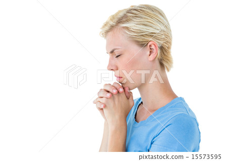 Pretty blond woman praying 15573595