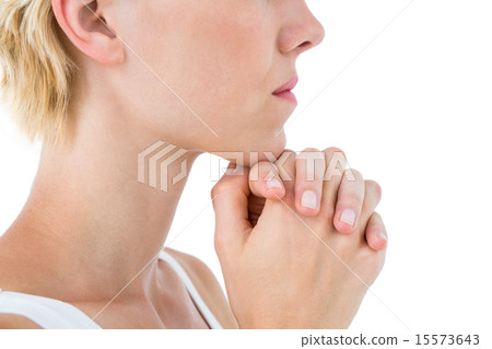 Pretty blonde woman praying 15573643