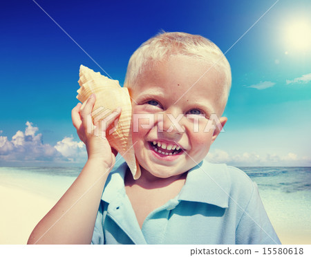 Little Boy Beach Seashell Fun Vacation Concept Little Boy Beach Seashell Fun Vacation Concept 15580618