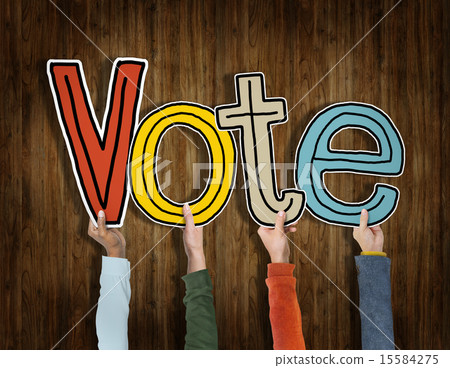Diverse Hands Holding the Word Vote 15584275