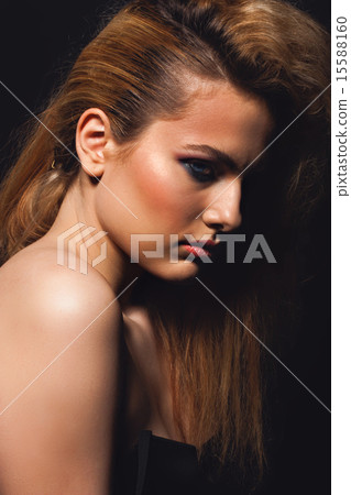 woman in rock style clothing 15588160