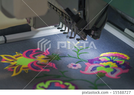Professional machine applying embroidery on tissue Professional machine applying embroidery on tissue 15588727