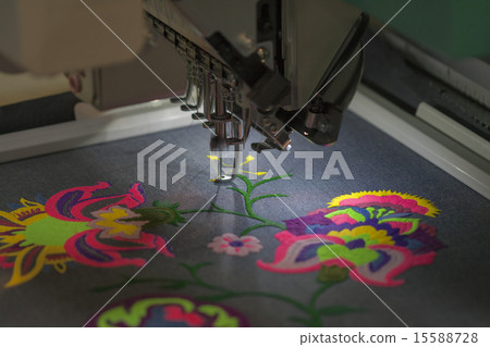 Professional machine applying embroidery on tissue 15588728
