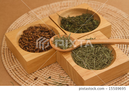 assortment of dry tea in wooden box 15589695