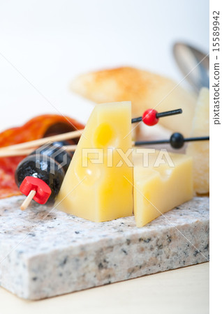 mix cold cut on a stone with fresh pears mix cold cut on a stone with fresh pears 15589942
