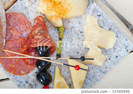 mix cold cut on a stone with fresh pears mix cold cut on a stone with fresh pears 15589946