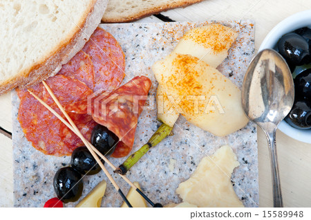 mix cold cut on a stone with fresh pears mix cold cut on a stone with fresh pears 15589948