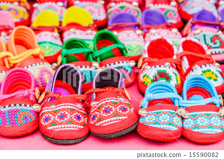 Hand-made baby shoes. 15590082