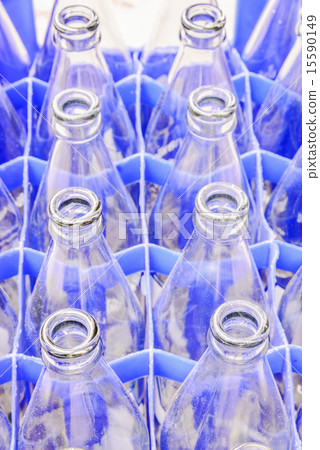Used glass bottles waiting for reuse  15590149