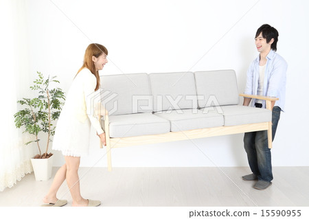 Couple carrying sofa 15590955