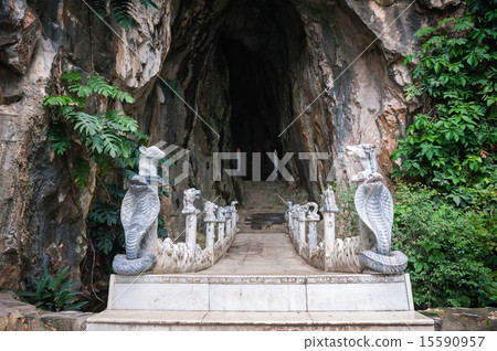 Entrance to Am Phu Cave with bridge and statues 15590957