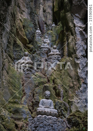 Sculptures of Buddha inside Am Phu Cave Danang 15590961
