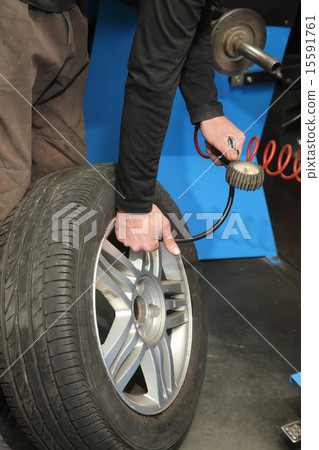 Car servicing, tire 15591761