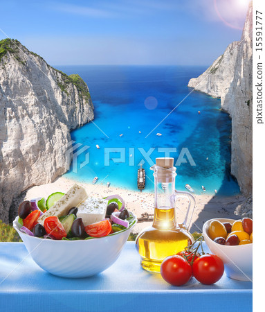 Navagio beach with Greek salad in Zakynthos,Greece 15591777