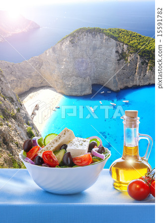 Navagio beach with Greek salad in Zakynthos,Greece 15591782