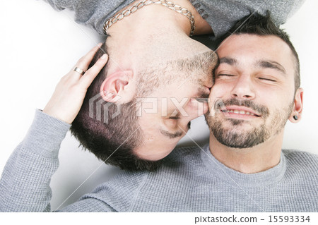 A homosexual couple over a white background 15593334