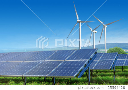 solar panels and wind turbines under blue sky 15594428