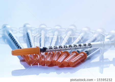 pile of syringes for insulin pile of syringes for insulin 15595232