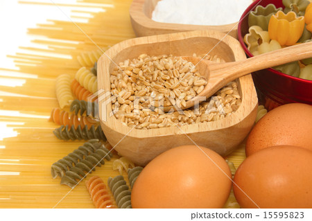 Grains of Wheat with pasta and food ingredient Grains of Wheat with pasta and food ingredient 15595823