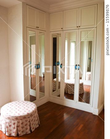 interior of mirrored wardrobe with reflection 15599876