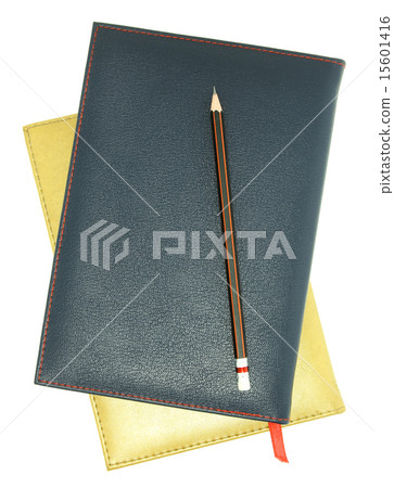 stack of leather notebook and pencil isolated stack of leather notebook and pencil isolated 15601416