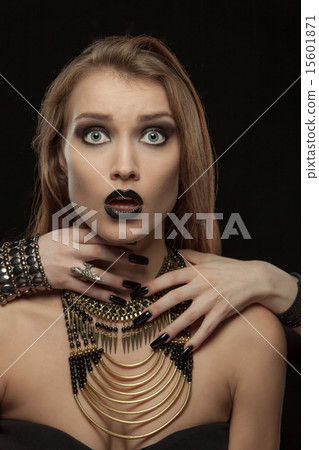 Gothic woman with hands of vampire on her neck Gothic woman with hands of vampire on her neck 15601871