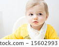Cute baby eating 15602993