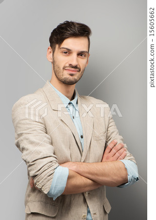Young man looking at camera Young man looking at camera 15605662