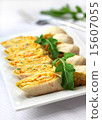 Rolls of lavash with onions, carrots and cheese 15607055