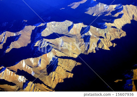 South America Andean Mountains where the summit of the mountains was illuminated by the morning sun 15607936