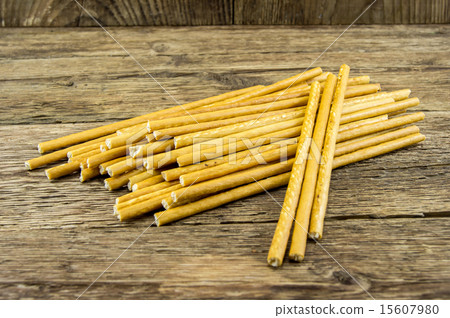 bread sticks lie on a wooden background bread sticks lie on a wooden background 15607980