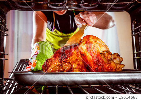 Cooking chicken in the oven at home. Cooking chicken in the oven at home. 15614665