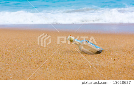 Bottle on a beach Bottle on a beach 15618627