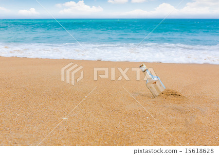 Bottle on a beach Bottle on a beach 15618628