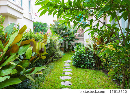 Flagstone path in home garden Flagstone path in home garden 15618820