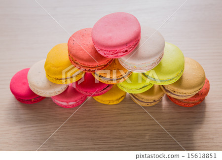 French colorful macarons on wood table French colorful macarons on wood table 15618851
