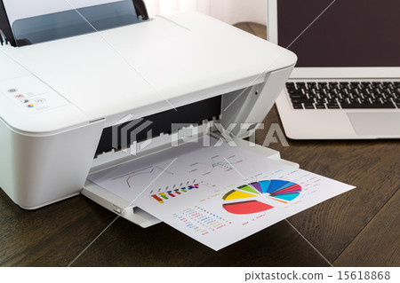 printer and Laptop on wood table 15618868