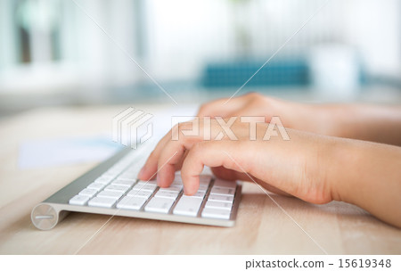 Closeup of business woman hand typing on keyboard 15619348