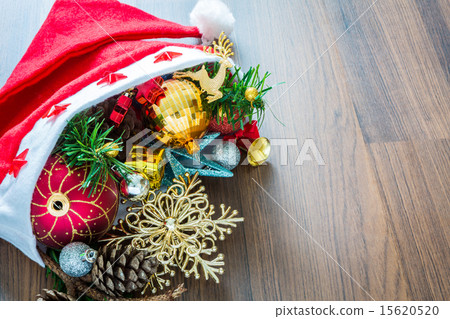 Santa Hat with Christmas decorations on wooden Santa Hat with Christmas decorations on wooden 15620520
