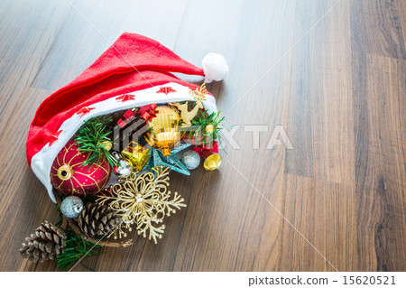 Santa Hat with Christmas decorations on wooden Santa Hat with Christmas decorations on wooden 15620521