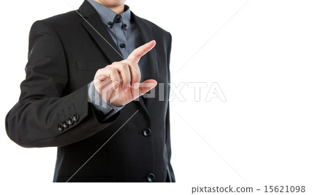 Business man touching an imaginary screen Business man touching an imaginary screen 15621098