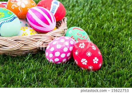 Basket of easter eggs on Fresh Green Grass 15622753