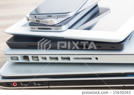 pile of devices pile of devices 15630263