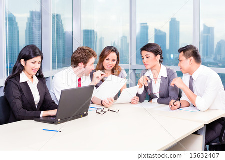 Asian Business Team in Strategy meeting 15632407